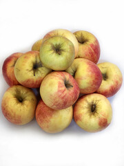 Ripe apples on a white background. Background with ripe apples