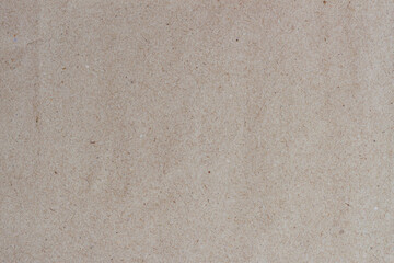 Paper texture cardboard background close-up. Smooth recycled cardboard texture with subtle natural imperfections. Minimalist background ideal for eco-friendly branding packaging