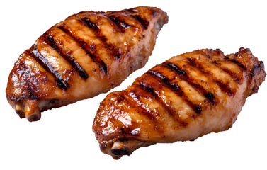 Two plies of grilled chicken wings isolated on a transparent background