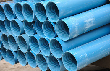 stack PVC casing pipe for a well. pipes used in drilling a water well