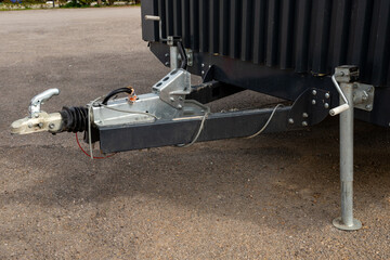 Modern tiny house on wheels with wooden exterior.