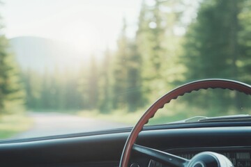 Obraz premium close-up photo shows vintage car dashboard steering wheel in focus sunlight streaming through windshield