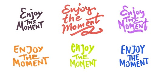 Fototapeta premium Set of hand-drawn colorful marker text “Enjoy the Moment” isolated on a white background 