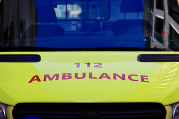 Closeup view of yellow coloured emergency ambulance car in the street, Antwerp, Belgium. © Travel Photos