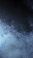 Abstract smoke texture over black. Fog in the darkness.
