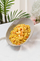 Special Chinese food shrimp fried rice on a simple background