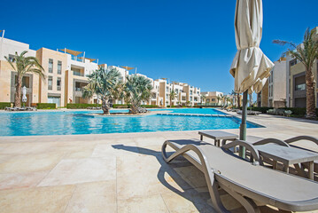 Outdoor swimming pool in a luxury tropical hotel resort