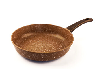 Metal frying pan:On white, wooden isolated background. Space for text.Ceramic non-stick coating: Kitchenware;Cooking food for chefs in the kitchen.Advertisement concept. Close-up