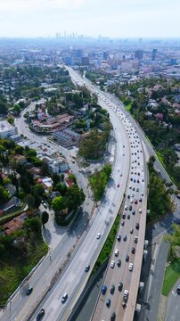 Aerial View of Highway and Los Angeles Skyline, Vertical