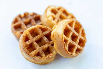 A stack of waffles with a white background
