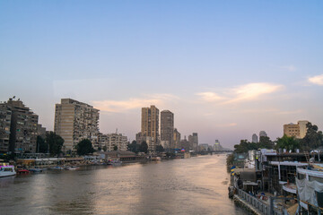Fototapeta premium Cairo Skyline at Dusk Viewed from a Tourist Bus.