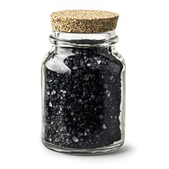 black salt in a glass jar isolated on white background