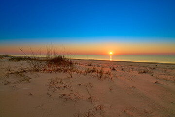 Sunrise over the Gulf of America at St. George Island Florida.