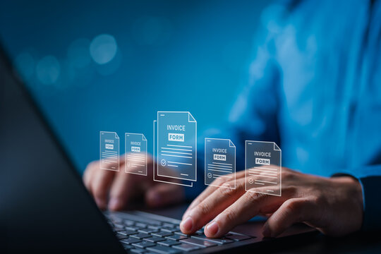 Electronic tax invoice of payment, digital sign invoice document and billing management concept. Man using laptop to manage electronic statements. E-tax, Online invoice processing and tax accounting.
