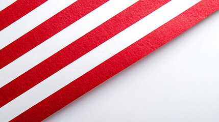 Red and white striped paper background close-up for festive presentation concept