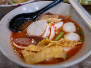 Delicious spicy noodle soup local restaurant food vibrant setting close-up view culinary delight