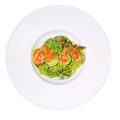 Savoring pesto shrimp pasta elegant food photography in a gourmet kitchen