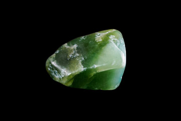 Green jade is a beautiful mineral that symbolizes harmony and prosperity. © daniiD
