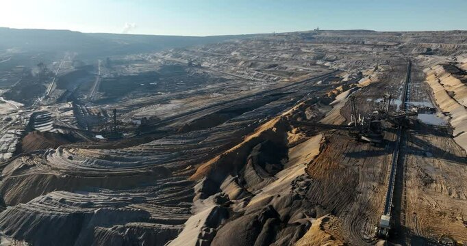 Aerial view of the open pit lignite mines of Hambach on a sunny day in Rhineland-Palatinate, Germany