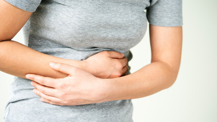 Young woman suffering from pain