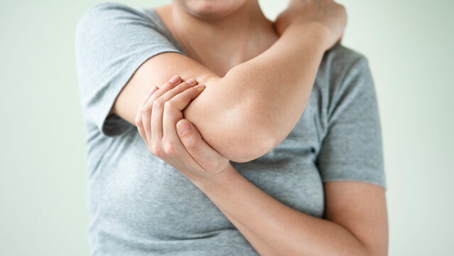 Young woman suffering from pain