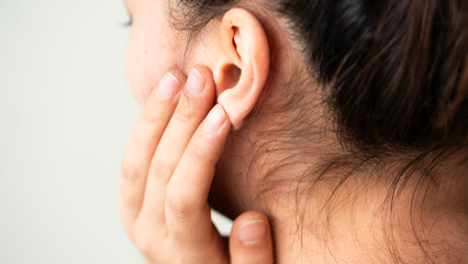 Young woman suffering from pain