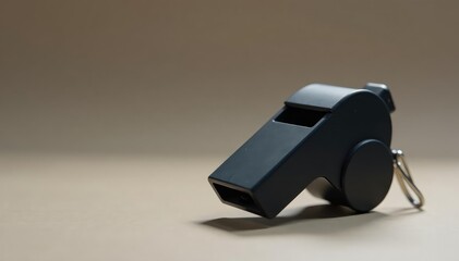 Classic black whistle, smooth surface, functional design , sound, communication, equipment