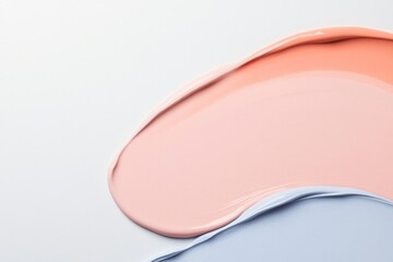 close-up shot of vibrant swirling cosmetic textures blending seamlessly together against solid white background