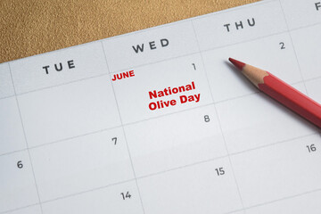 June 1. writing text National Olive Day on calendar date. Save the date. Day of the year concept.