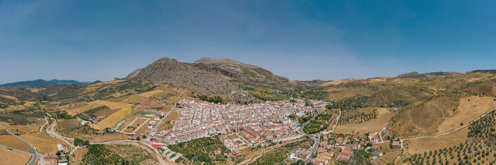 Aerial view of Valle de Abdalajis Village - Malaga Andaluc&iacute;a. Countryside of Spain. Typically, white village at mountain base, surrounded with agriculture field. Travel destination.