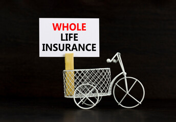 Whole life insurance symbol. Concept words Whole life insurance on beautiful white paper on...