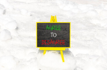 Agree to disagree symbol. Concept words Agree to disagree on beautiful blackboard. Beautiful white...