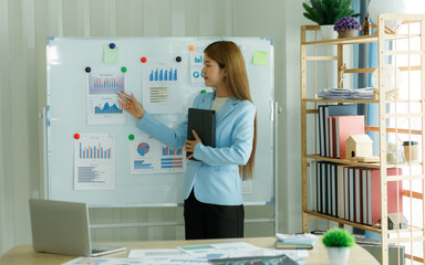 Analysts who study past consumer behavior in the market through statistical graphs to adapt and plan future marketing strategies.