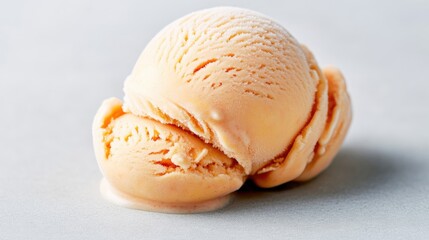 Close-up of a scoop of orange ice cream