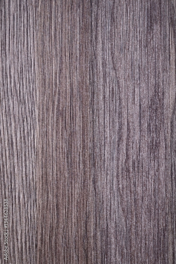 Poster A close-up shot of a wooden table with a knife and fork, perfect for rustic or nature-inspired settings.