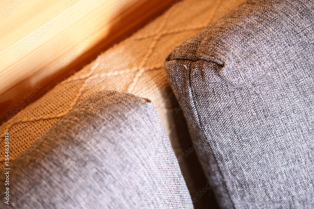 Aufkleber Close-up shot of a couch with a pillow in focus.