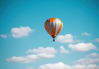 Fototapeta premium Colorful hot air balloon soaring in a clear blue sky