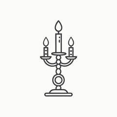 Hand drawn sketch style vintage candlestick with burning candle Retro engraved vector illustration