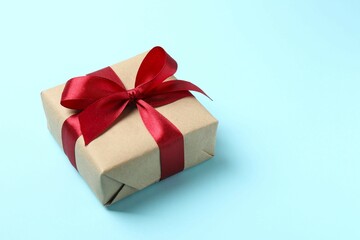 Beautiful gift box on color background