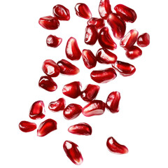 falling pomegranate seeds on white background