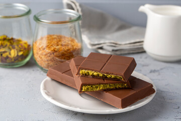 Dubai chocolate, milk chocolate filled with pistachio paste and kunefe