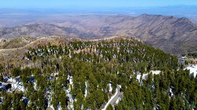 View of Mt. Lemmon, Arizona, with the Catalina Scenic Highway, snow, near the Ski Valley, with snowy trees near Tucson