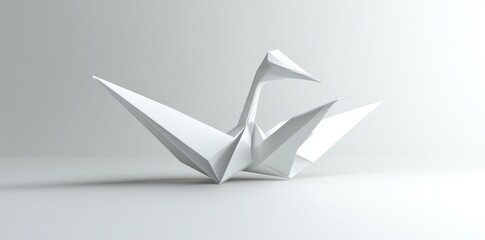Naklejka premium A detailed white origami crane sits on a smooth bright surface