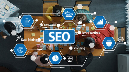 A top-down view of a collaborative team meeting focusing on SEO strategies, featuring data mining,...