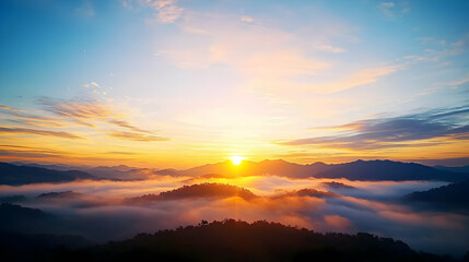 Obraz premium Sunrise Over Misty Mountains