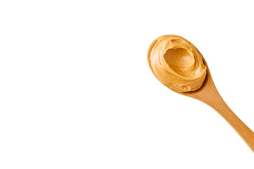Delicious peanut butter on a wooden spoon
