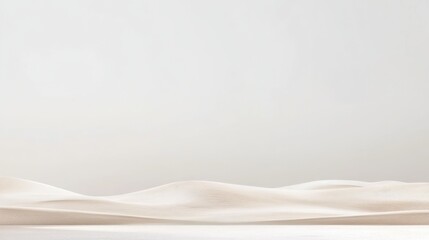 Fototapeta premium Tranquil White Sand Dunes Under Soft Gray Sky in Minimalist Landscape Composition