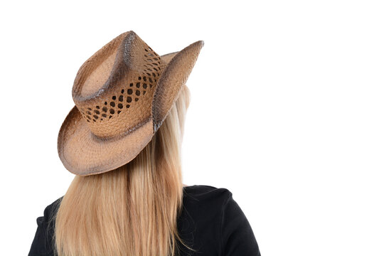 girl with hat looking away