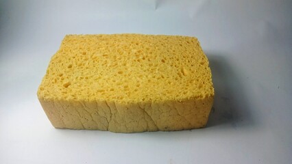 Yellow sponge isolated in white background 