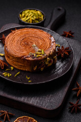 Round puff pastry croissant with pistachio filling or new york roll
